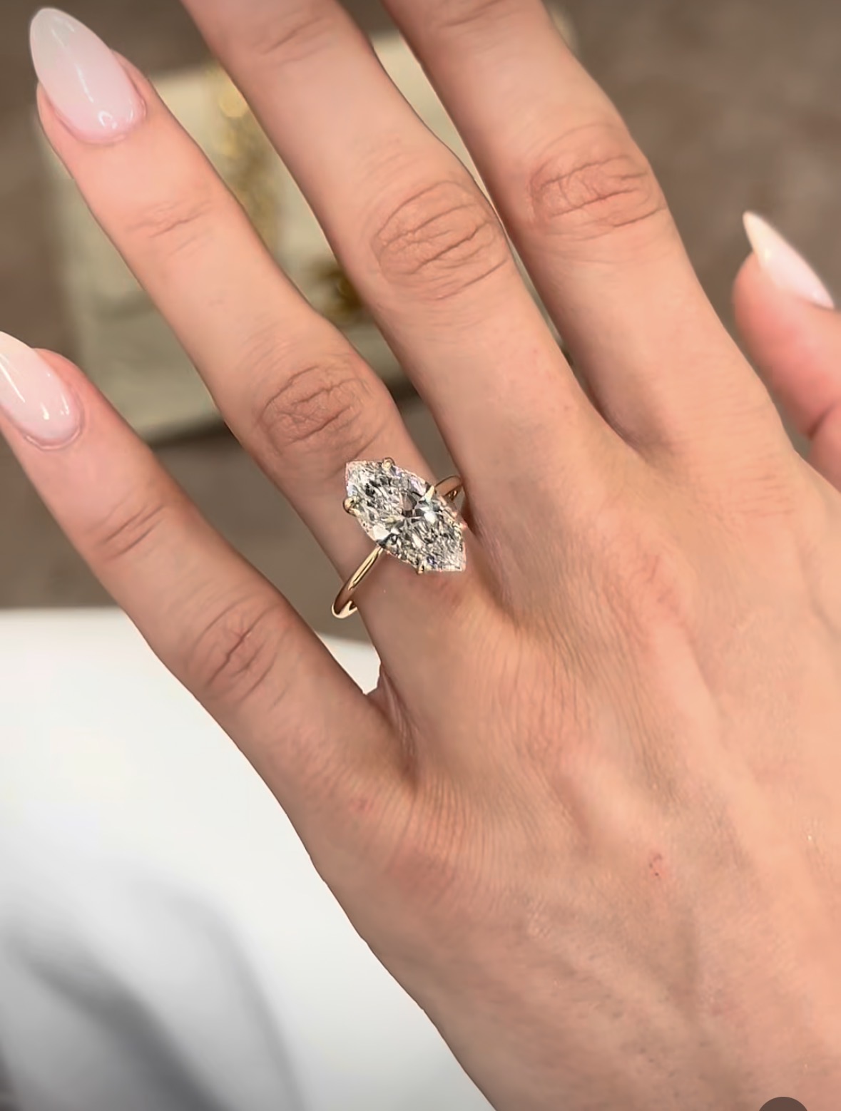 marquise · north-south diamond bond ring, studio view